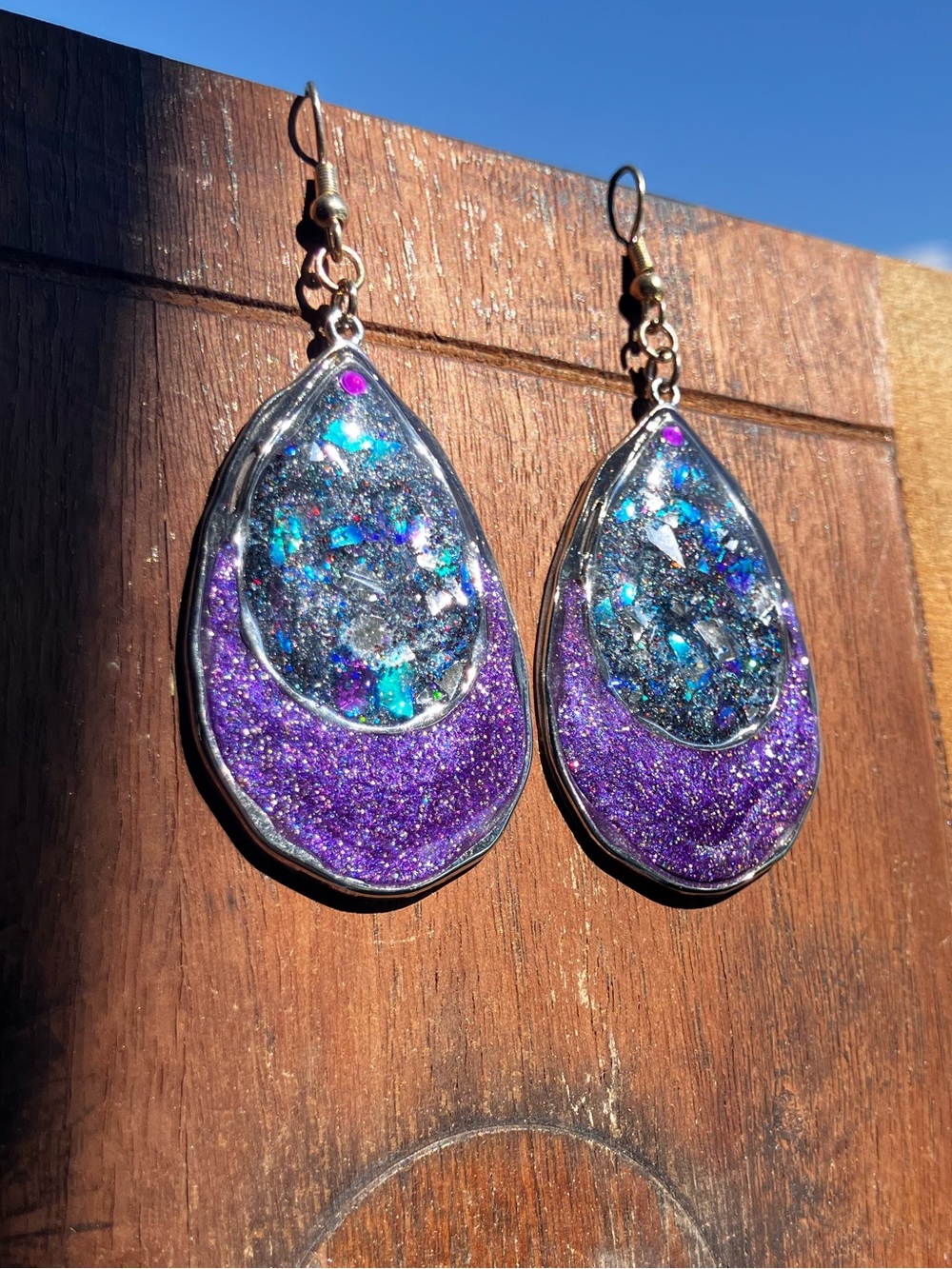 Purple and color shifting glitter resin earrings with silver accent